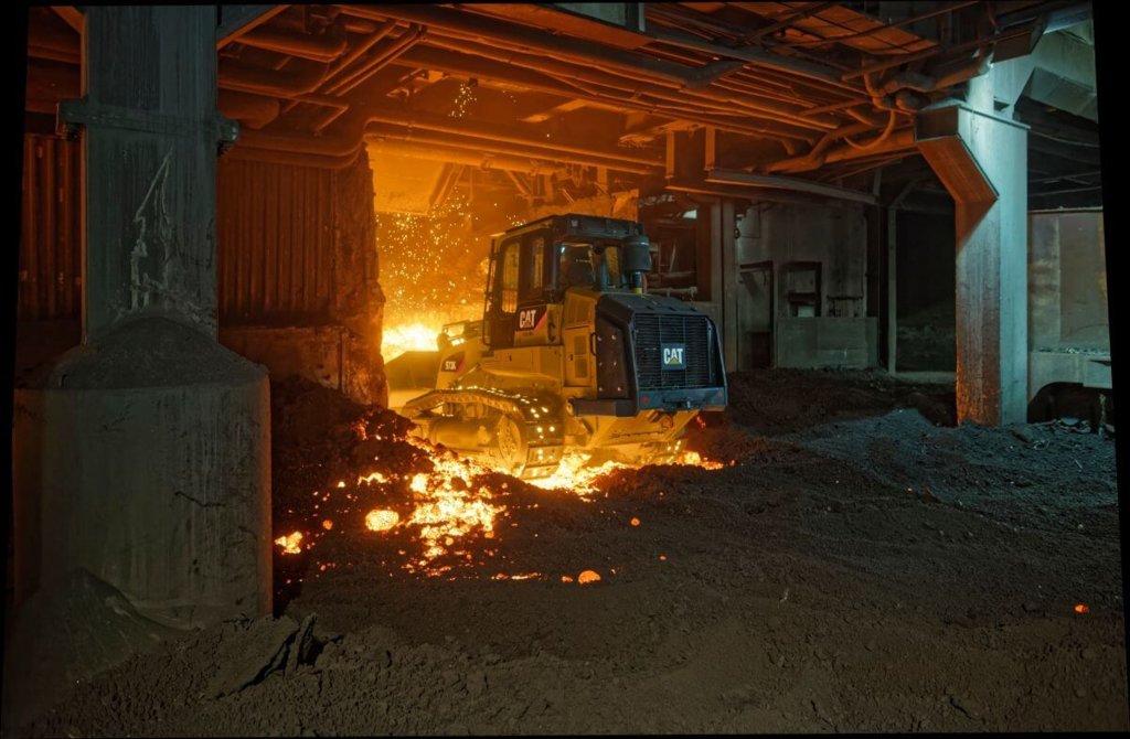 973K Track Loader equipped with a Steel Mill package goes in to the slag furnace